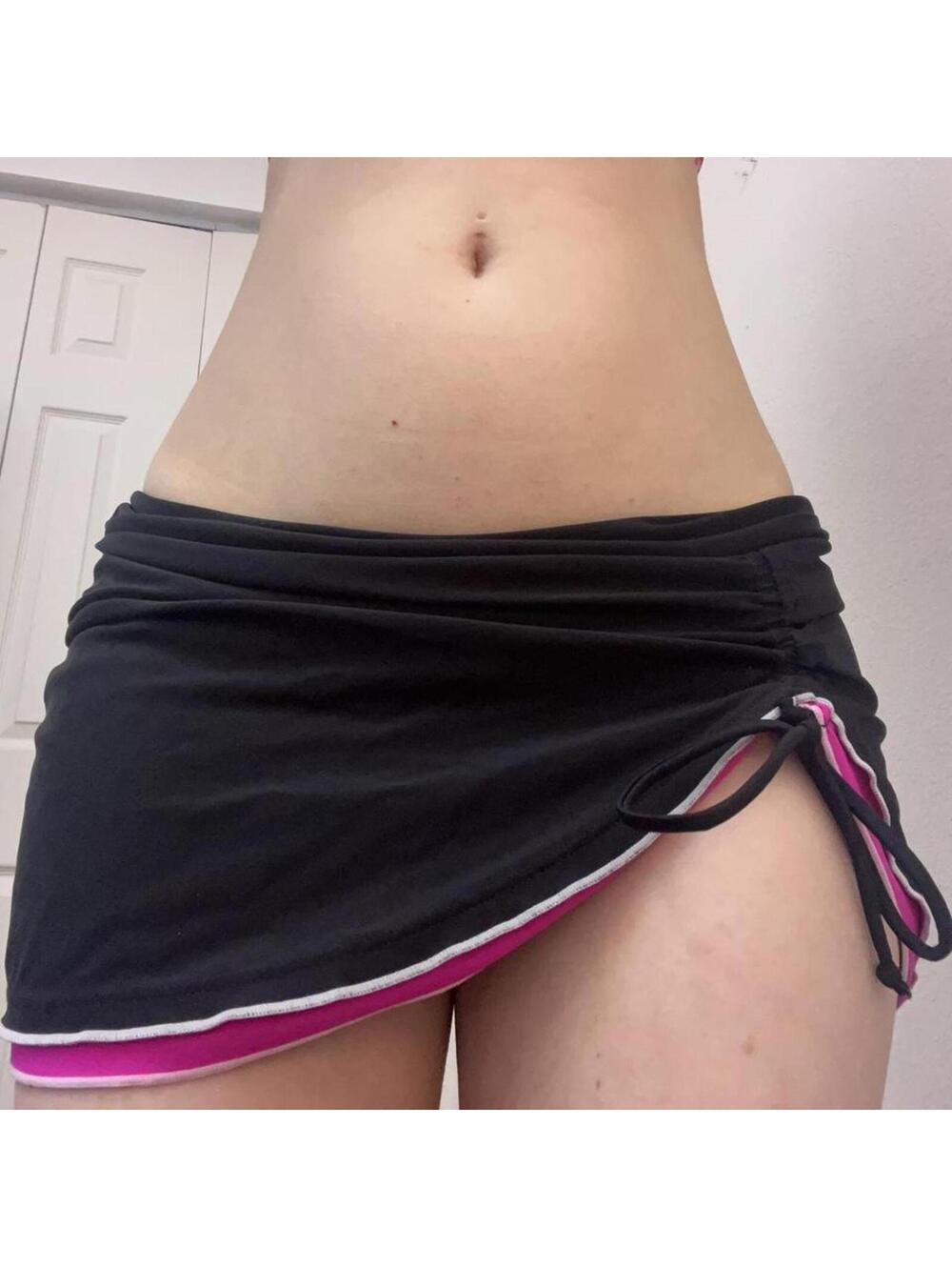 black and pink mini swim skirt